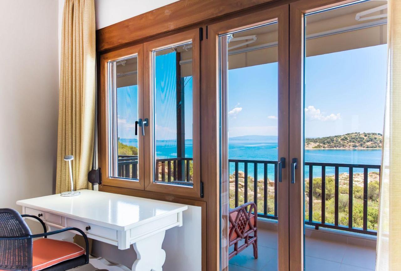 Nereus & Oceanus Beachfront Apartments, Lagonisi Beach #Feelslikehome オルモス・パナギアス エクステリア 写真
